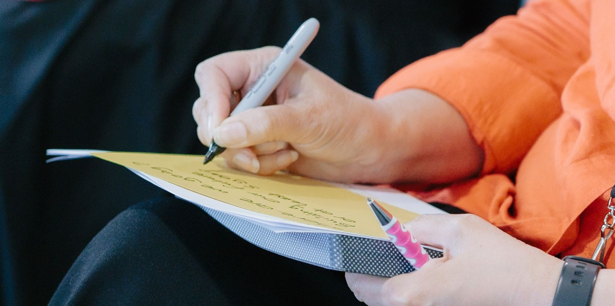 Hand writing on notepad
